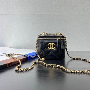 CHANEL Black Mini Quilted Bag with Gold Chain